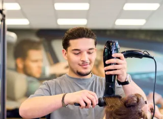Khaled, student Kapper bij het Beauty College